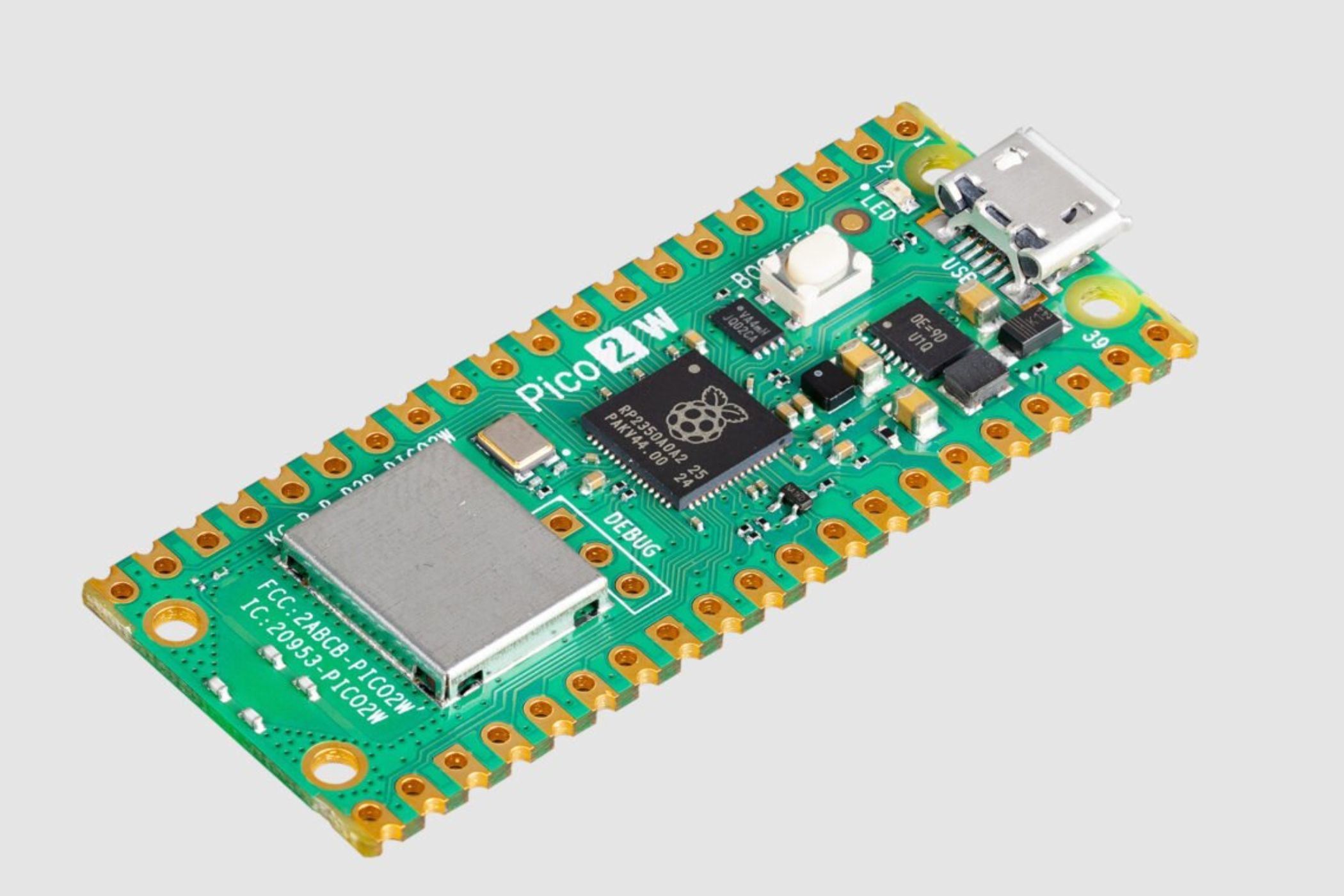 Uma placa microcontroladora Raspberry Pi Pico 2 W.