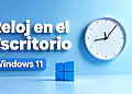 Reloj persistente Windows 11: opciones para mostrar un reloj persistente, limitaciones y decisiones prácticas, con fondo azul, icono de Windows y reloj analógico minimalista.