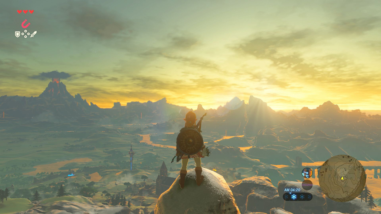 Link osserva il vasto mondo di Hyrule dalla cima di una montagna in The Legend of Zelda: Breath of the Wild.
