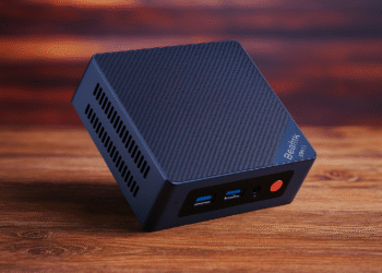 Por que um NUC ou Mini PC é ideal para seu laboratório doméstico: Comece hoje mesmo! ⚡ 13 Por que um NUC ou Mini PC é ideal para seu laboratório doméstico - Um mini PC estilo NUC em uma mesa de madeira; um dispositivo compacto e de baixo consumo de energia com portas USB frontais e ventilação, ideal para seu laboratório doméstico.