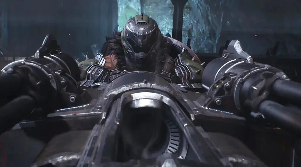 Armi da Doom The Dark Ages: il Doom Slayer punta due cannoni gemelli da una macchina d'assedio in un ambiente buio e cavernoso.