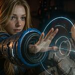 Pragmata Lunar - Young woman in a futuristic blue spacesuit using a glowing holographic interface in sci‑fi setting - Pragmata Lunar themed space adventure artwork.